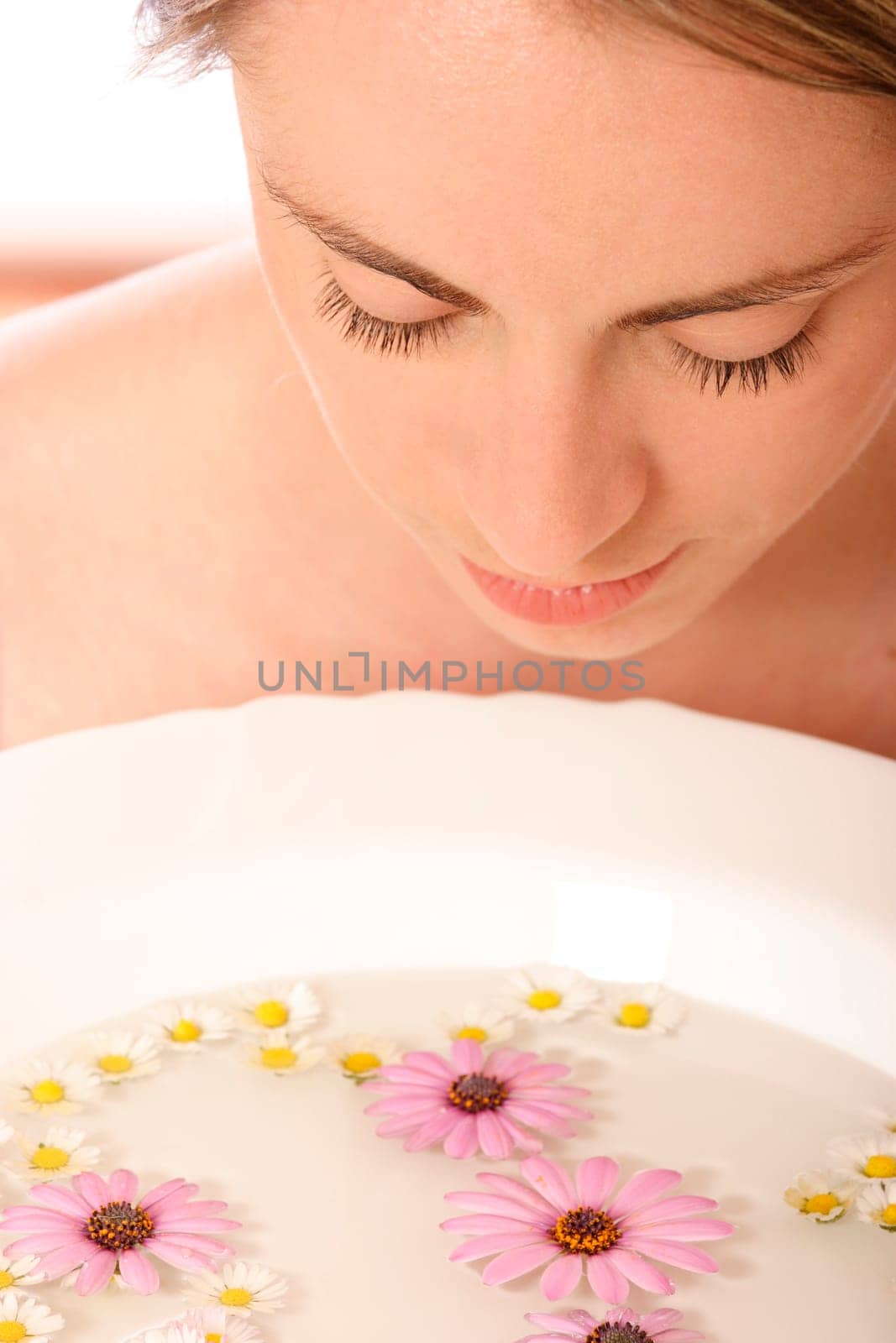 Stock photo of a young woman, beauty concept, facial wash