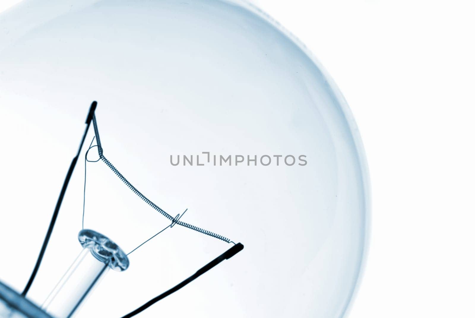 close-up of a lightbulb isolated over white