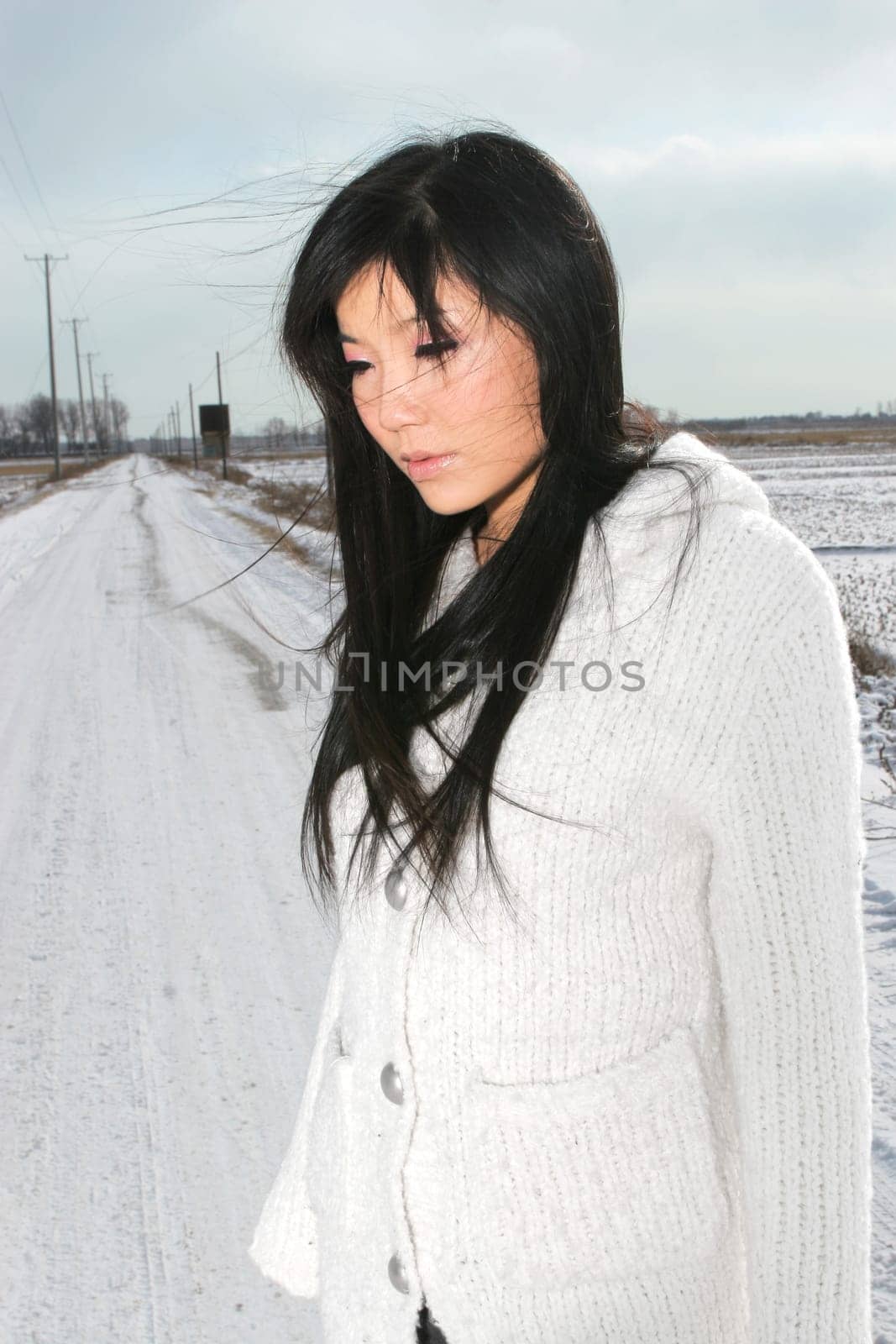 A beautiful chinese girl in white .