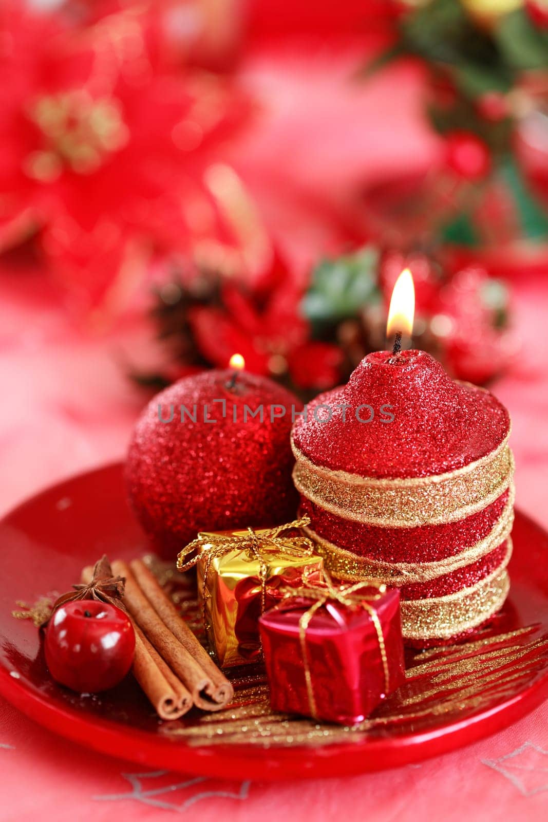Festive tabletop or table decoration for Christmas time in red tone