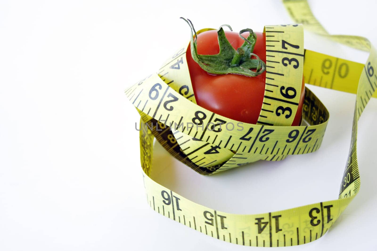 Tomato with measuring tape