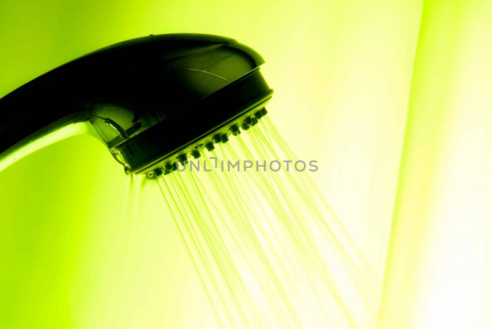 backlit showerhead with green overall color