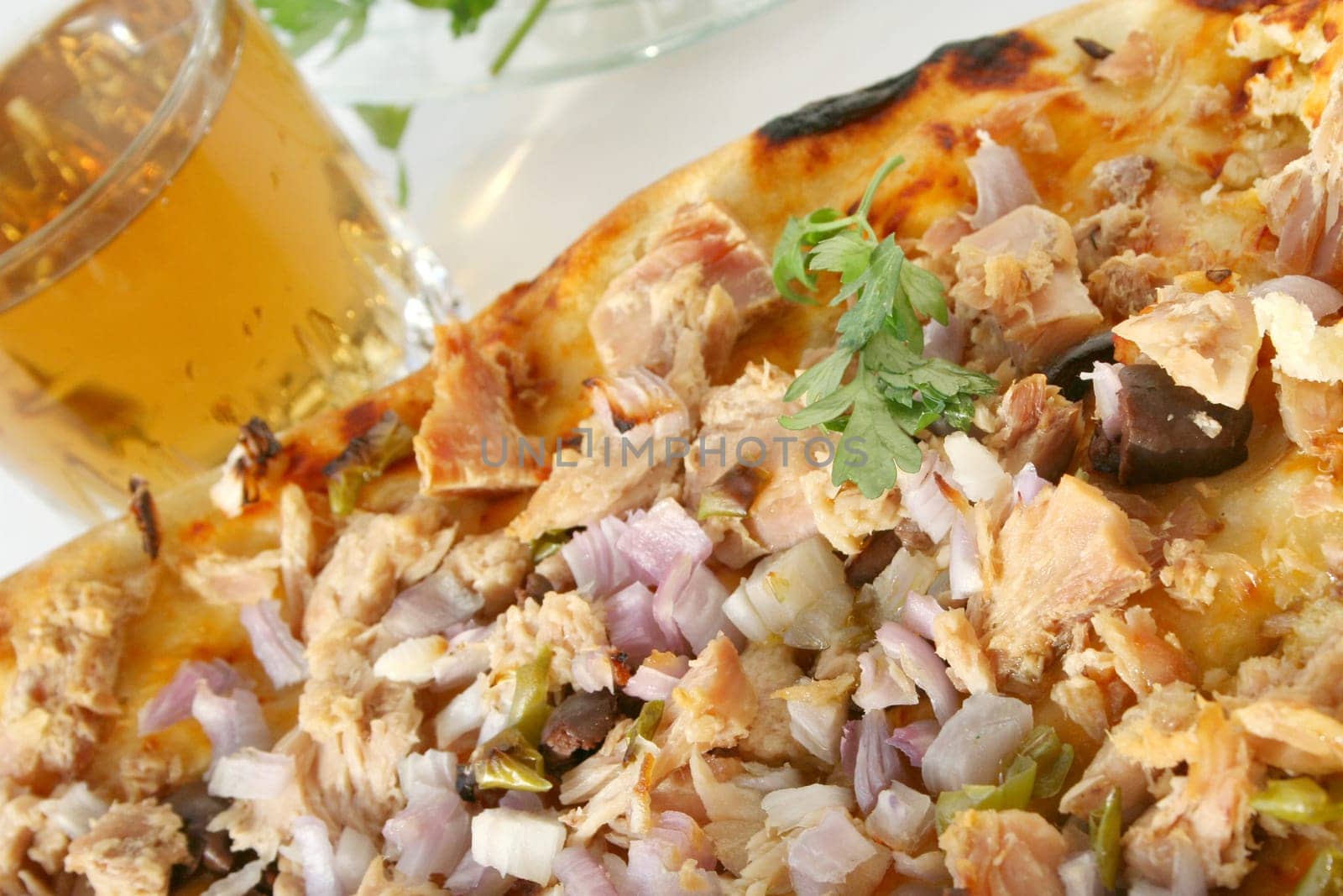 Pizza with tuna fish & apple juice
