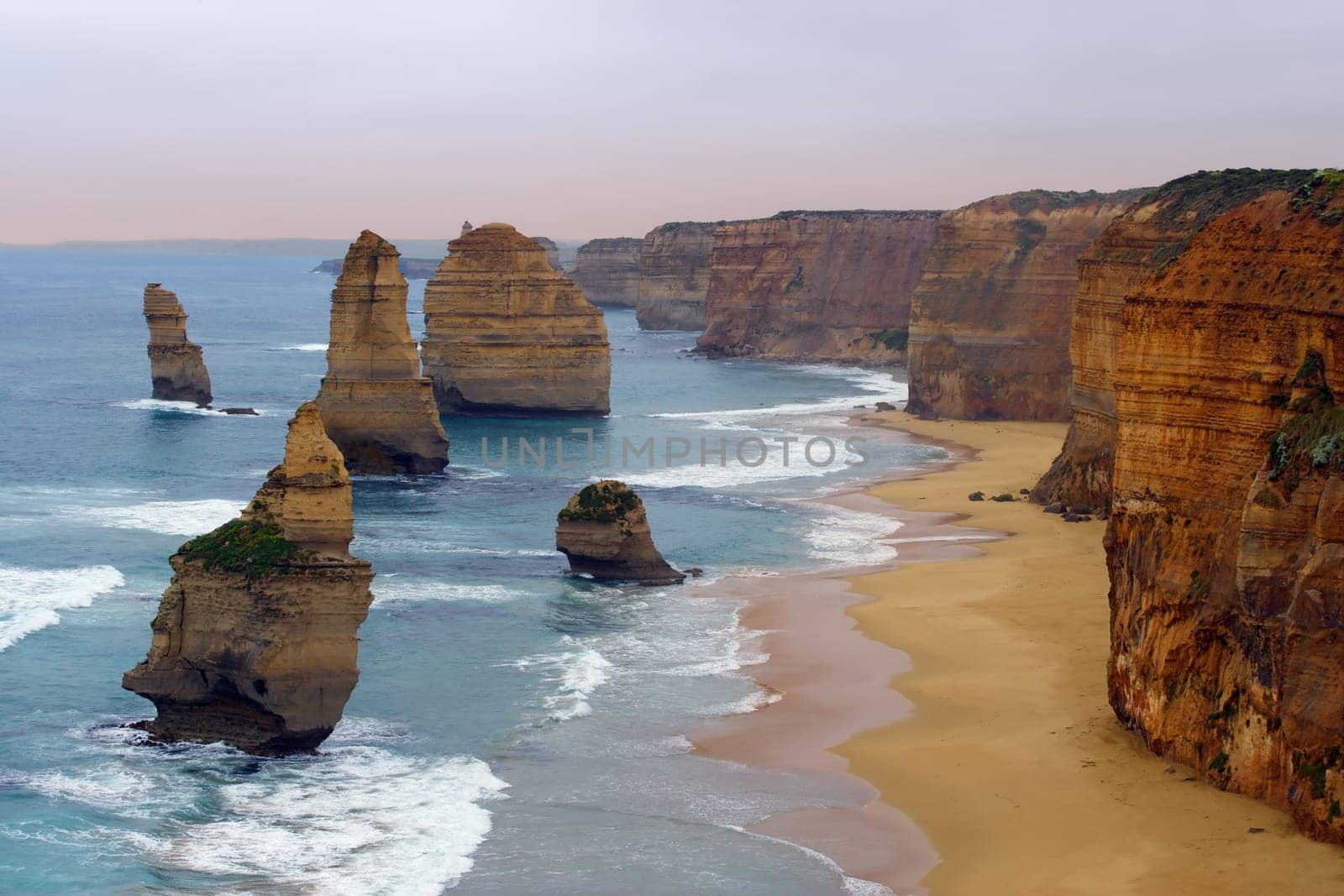 The Twelve Apostles along the Great Ocean Road, Australia.  Photo was taken in December 2004 before the 'apostle' in the front had fallen.