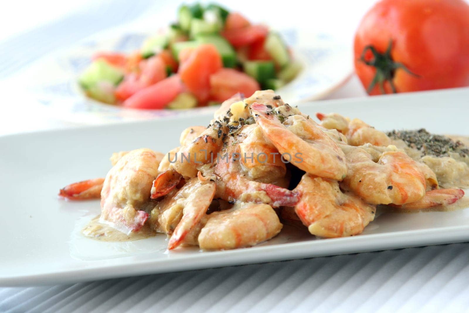 Shrimps dish with sauce & salad
