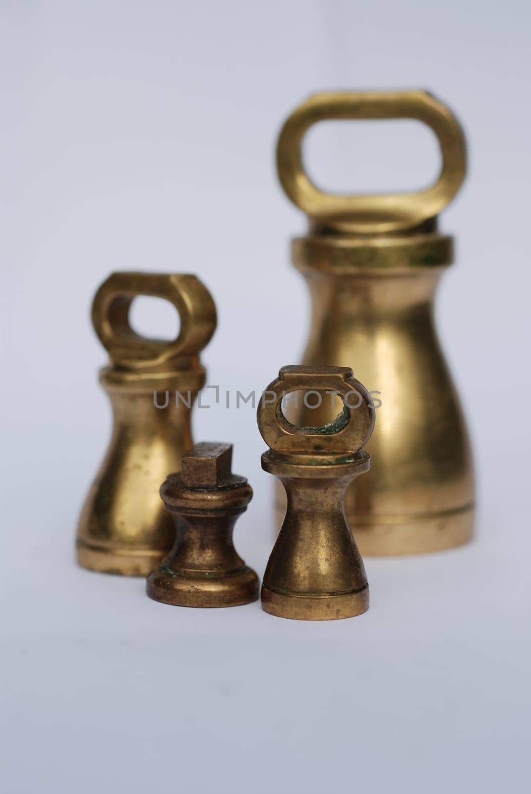 Assorted weights used on old fashioned cooking scales