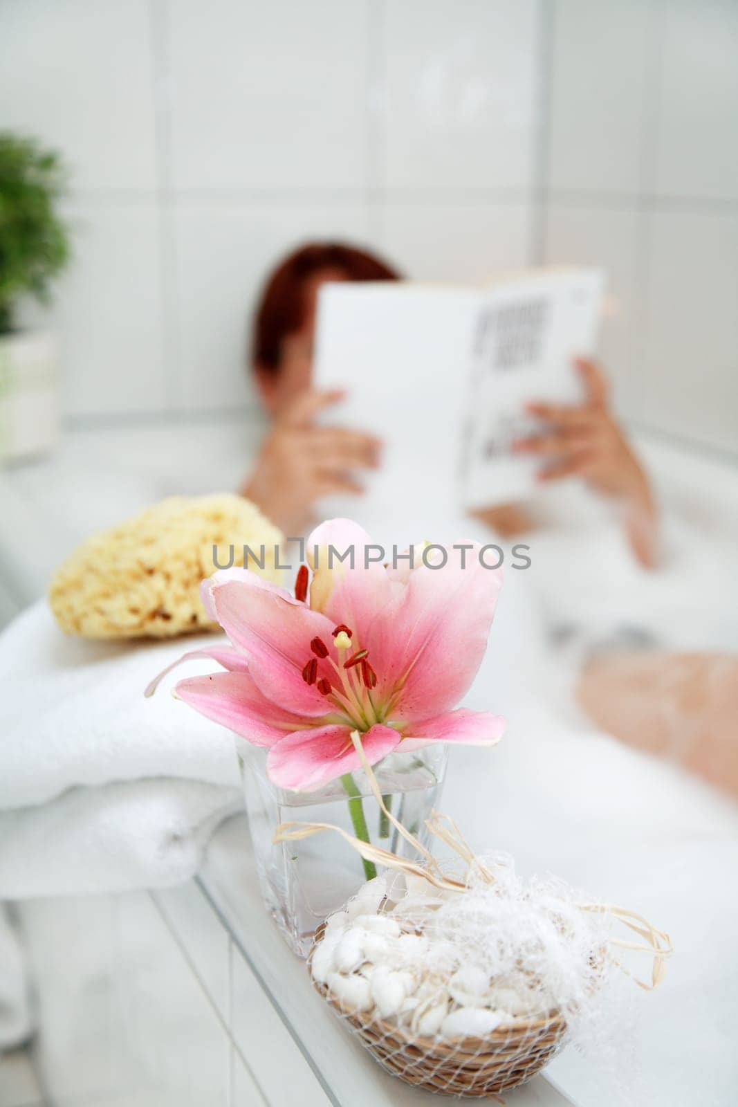 Taking a bath and relaxing with the book