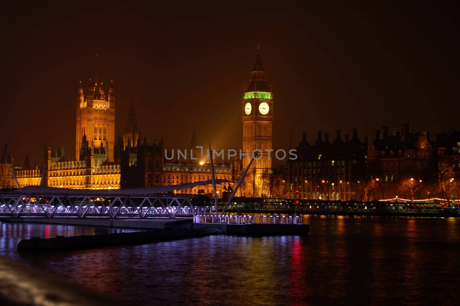 Houses of Parliament and Big Ben across the river Thames at night