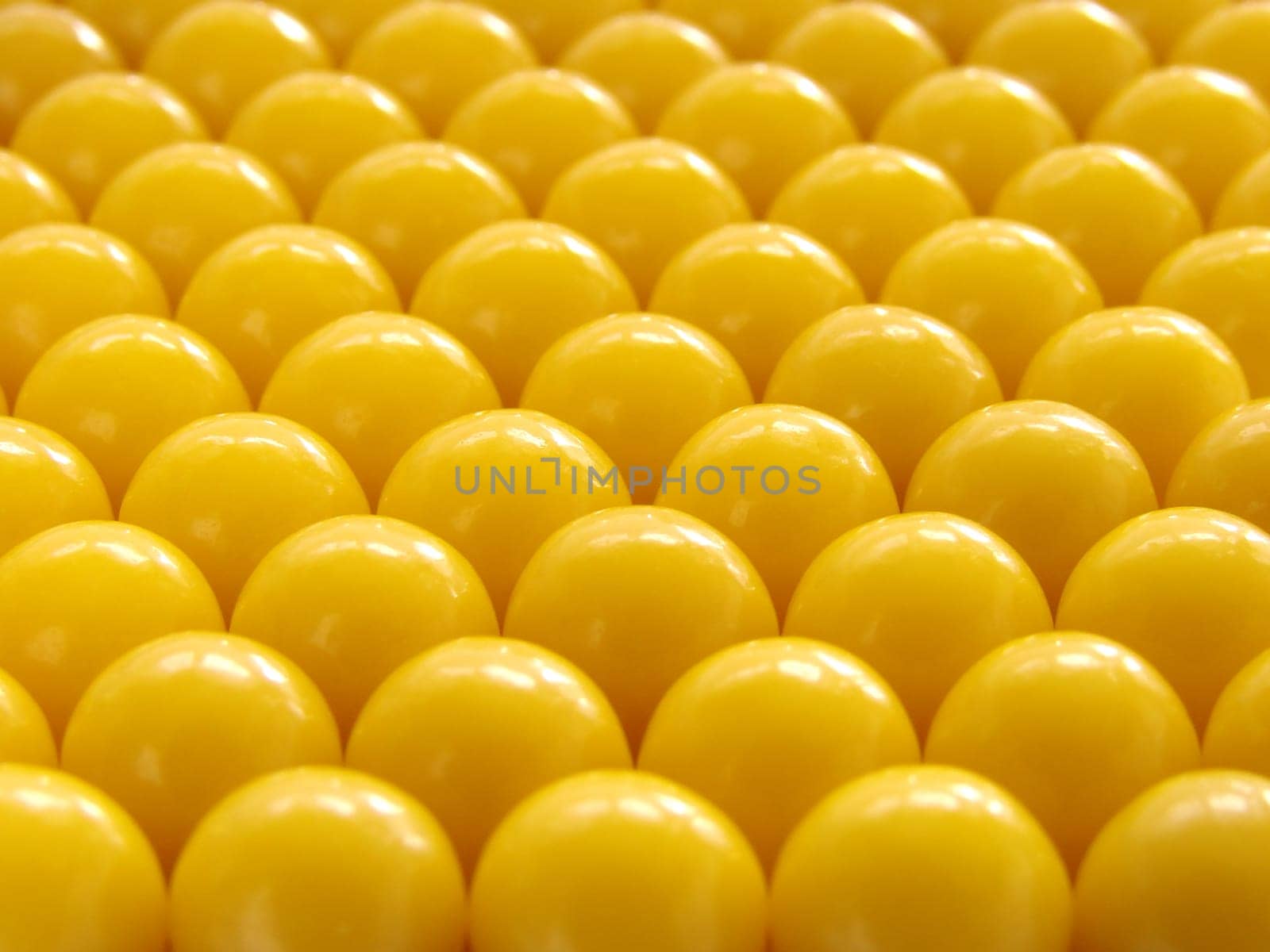 yellow vitamin pills background
