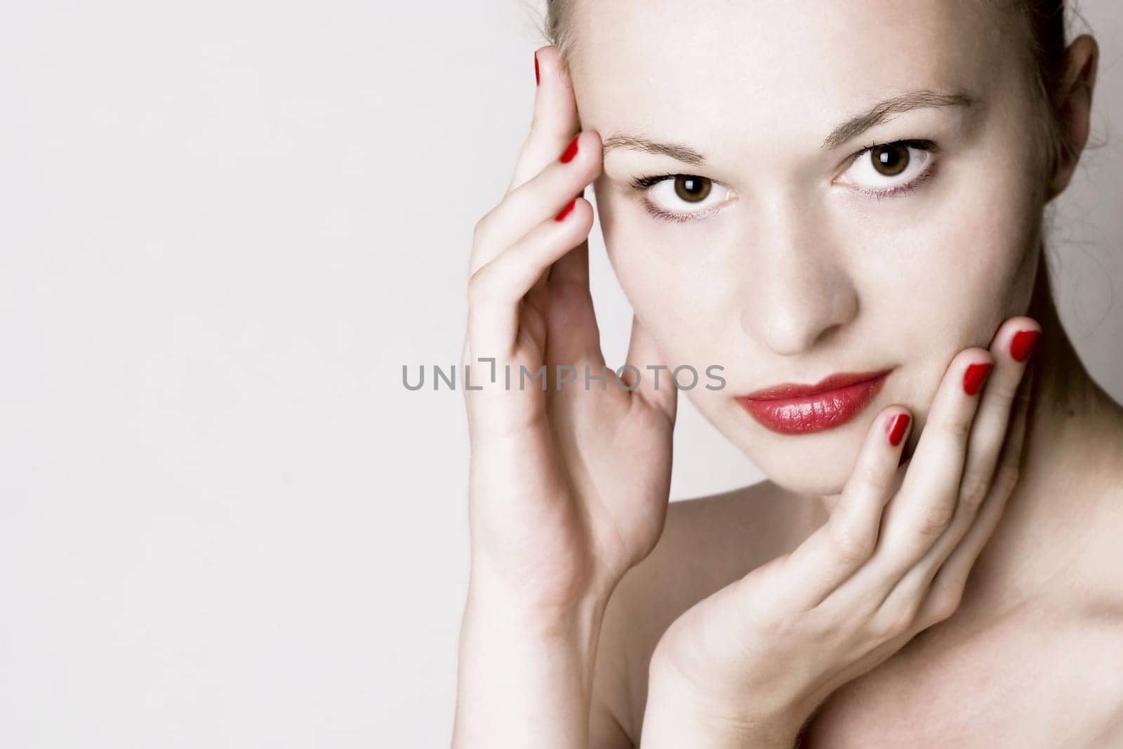 Beautiful young woman. White background.