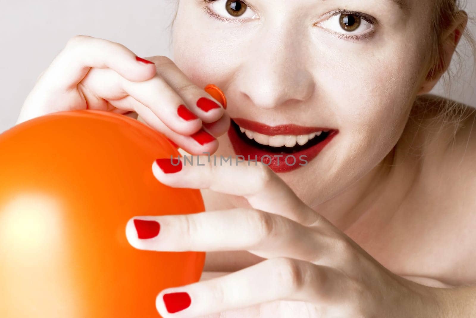 Woman with balloon.