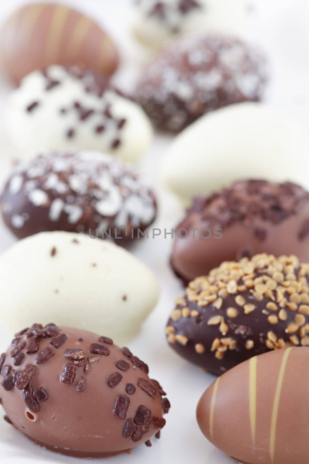 Easter chocolate egg on white background
