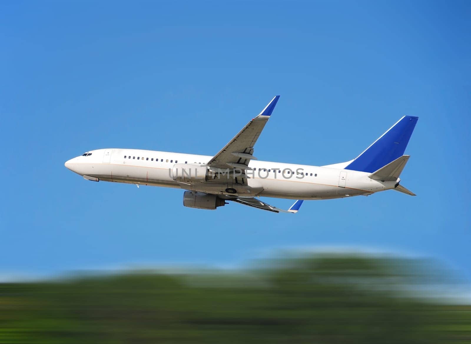 Jet airplane taking off with motion blur