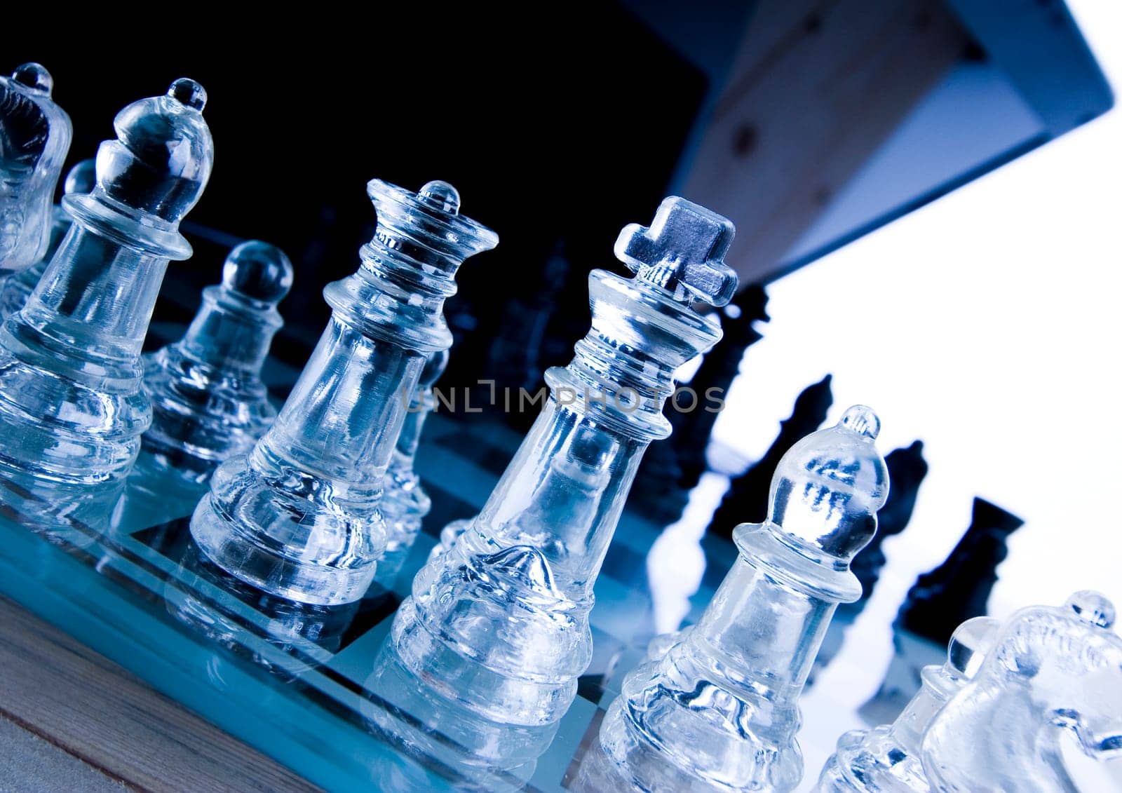 Chess - a game for two people that is played on a board with 64 black and white squares called a chessboard.