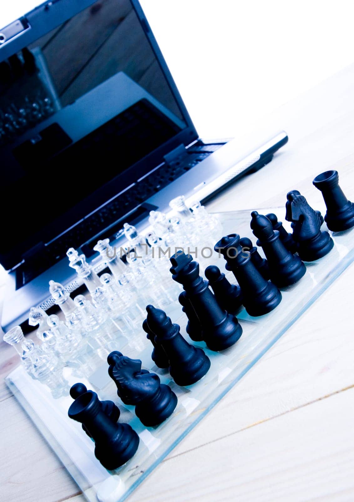 Chess - a game for two people that is played on a board with 64 black and white squares called a chessboard.