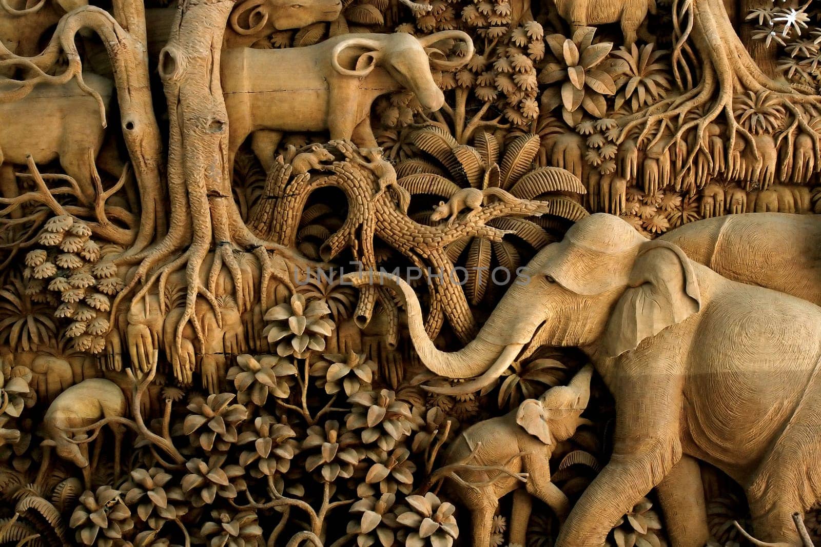 Section of an ancient mural wood carving from Thailand.
