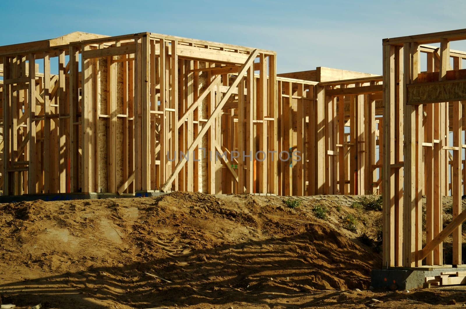 Construction site with new home framing.