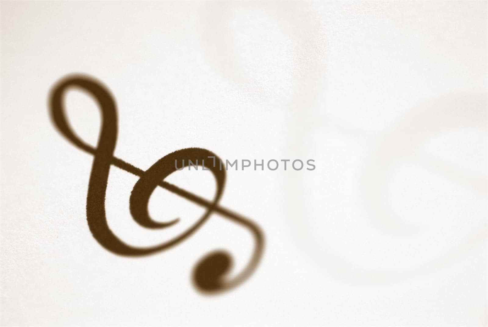 Treble Clef musical symbol on a sheet music