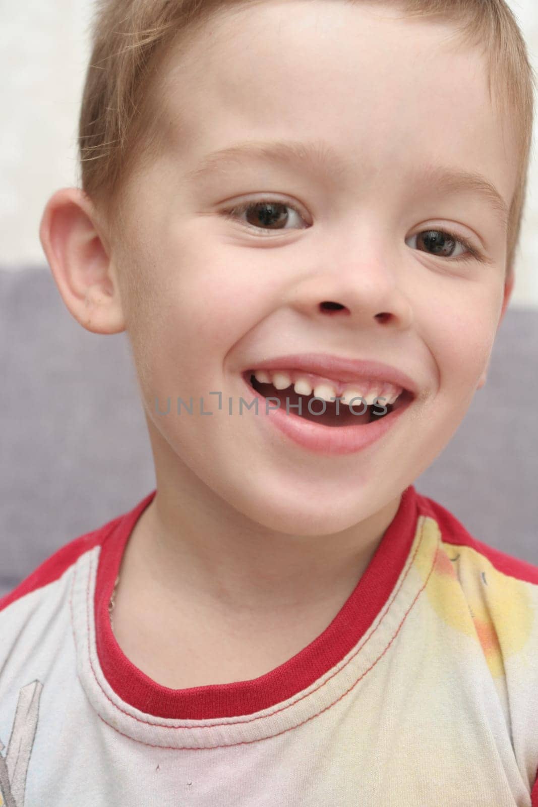 The person of the happy boy which smiles