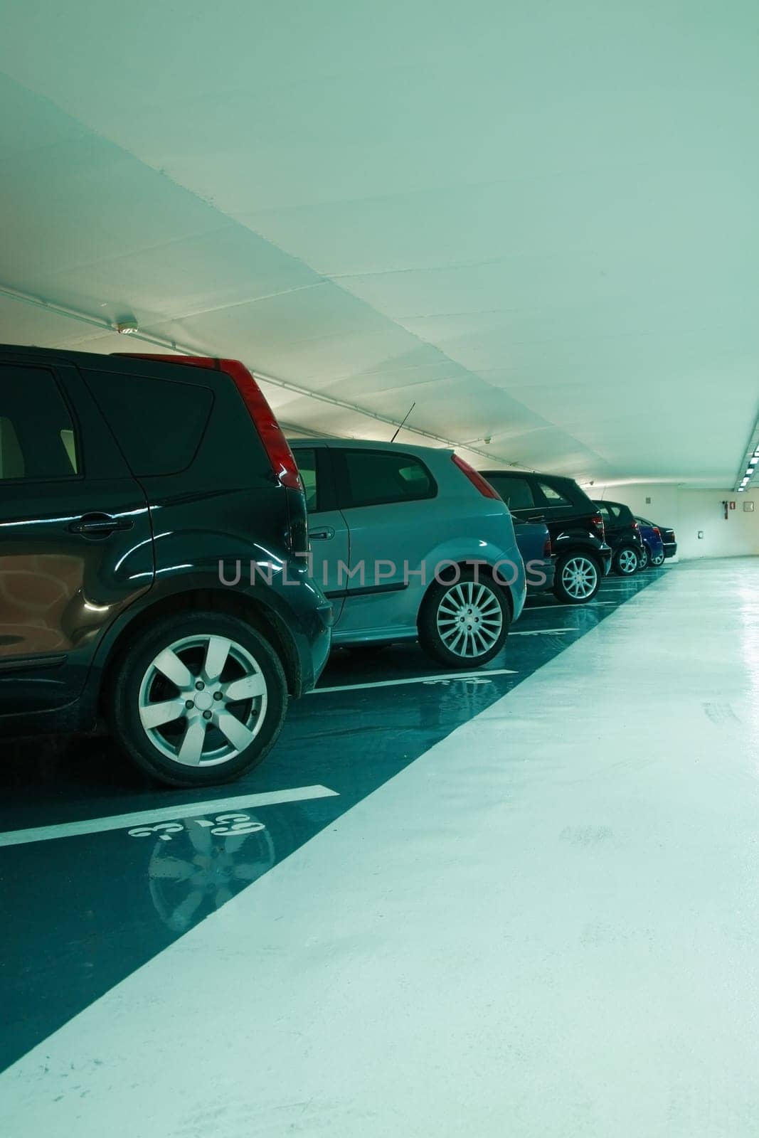 Parking in the parking garage in cyan tone