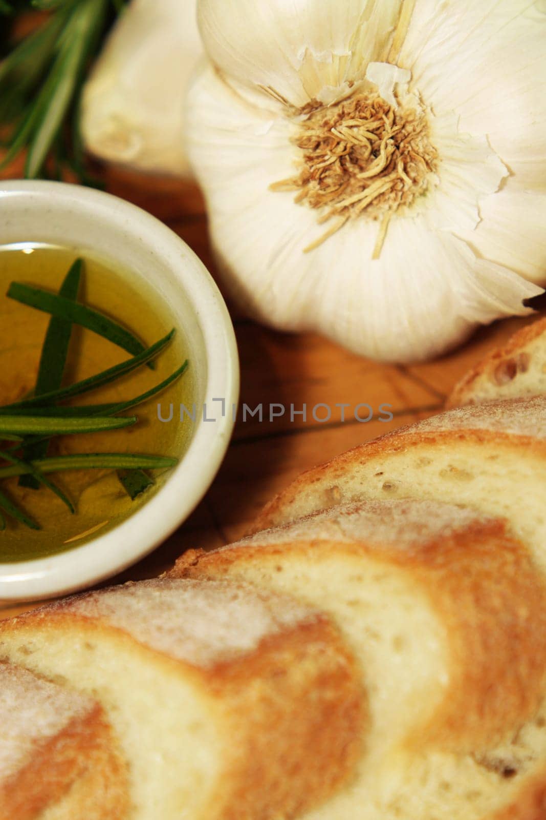 Preparation for making garlic bread. A series of pics in landscape and portrait format. Shallow and deep depth of field.