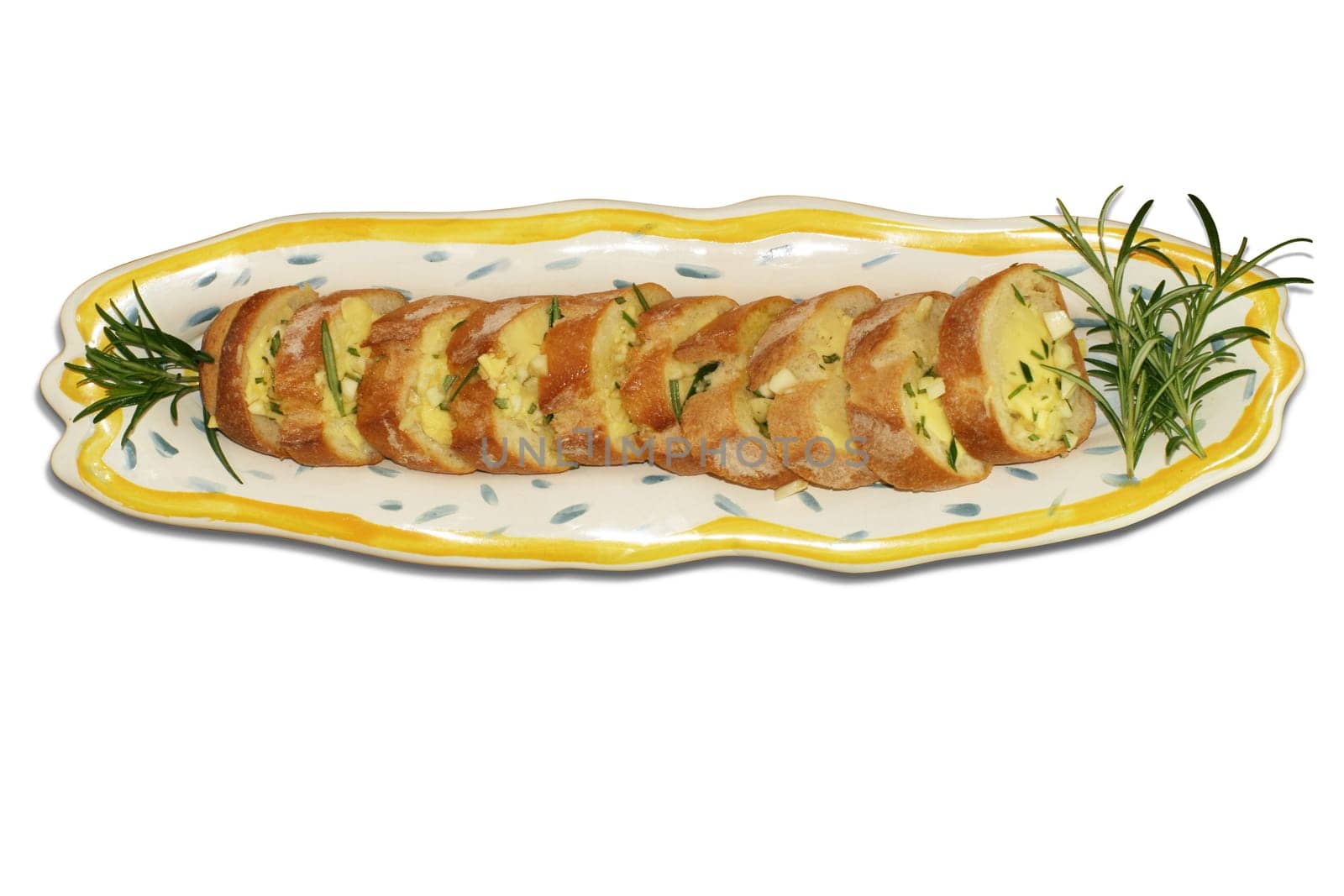 Preparation for making garlic bread. A series of pics in landscape and portrait format. Shallow and deep depth of field. This image contains a clipping path.
