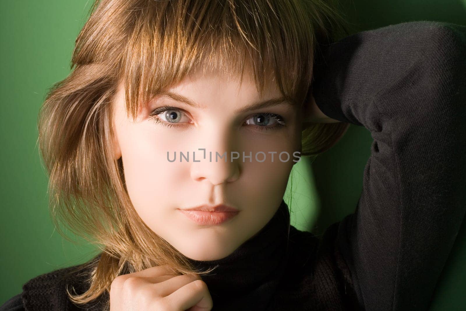 a pretty girl in a black sweater