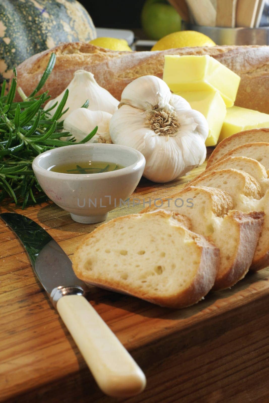 Preparation for making garlic bread. A series of pics in landscape and portrait format. Shallow and deep depth of field.
