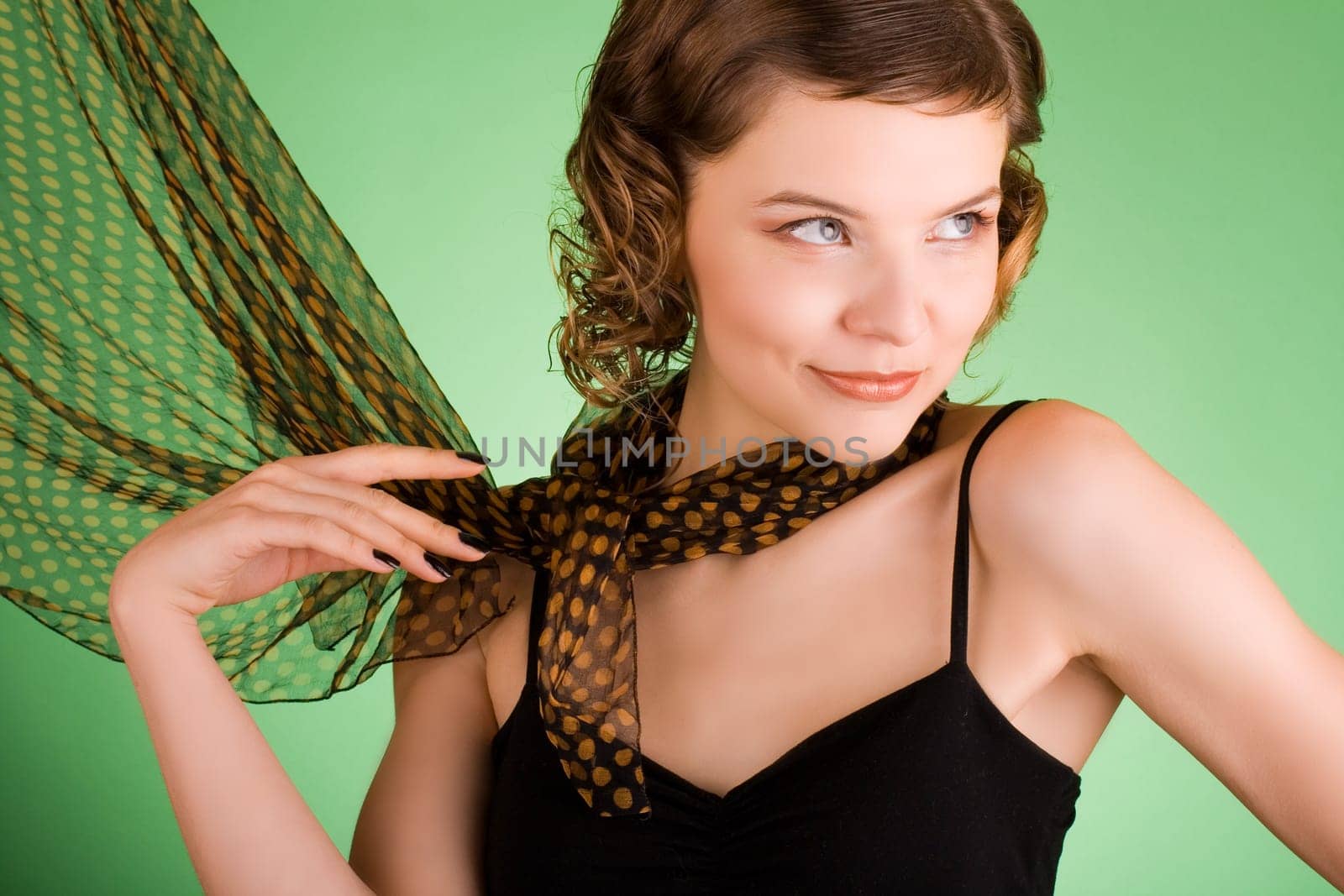 a glamorous girl in the evening dress