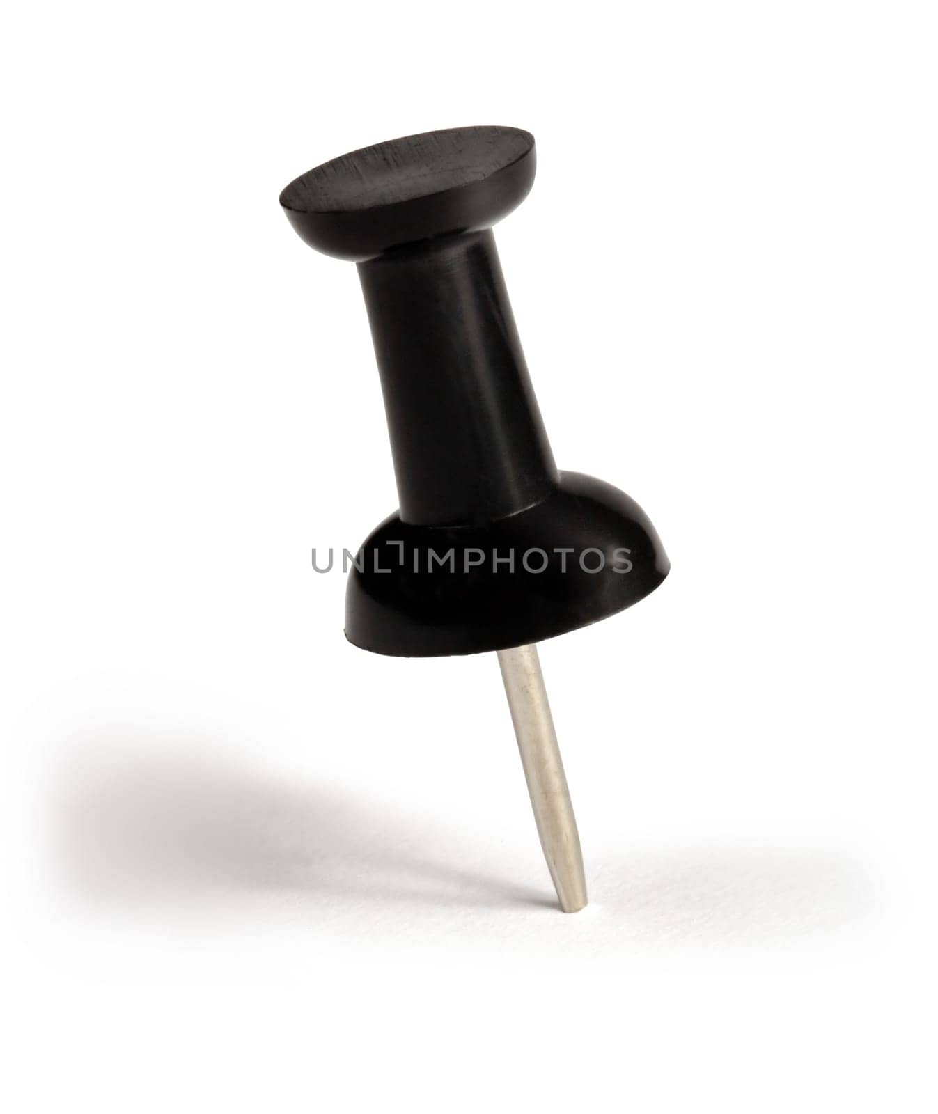 Macro image of a single black push-pin.