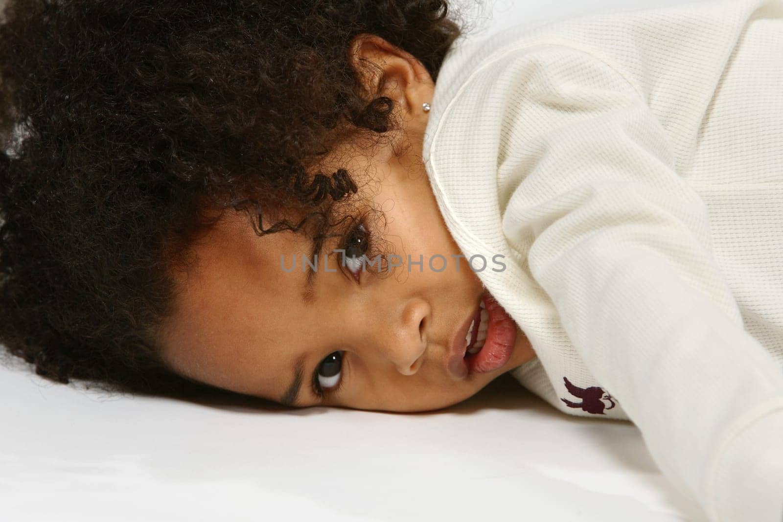 Lying in a studio