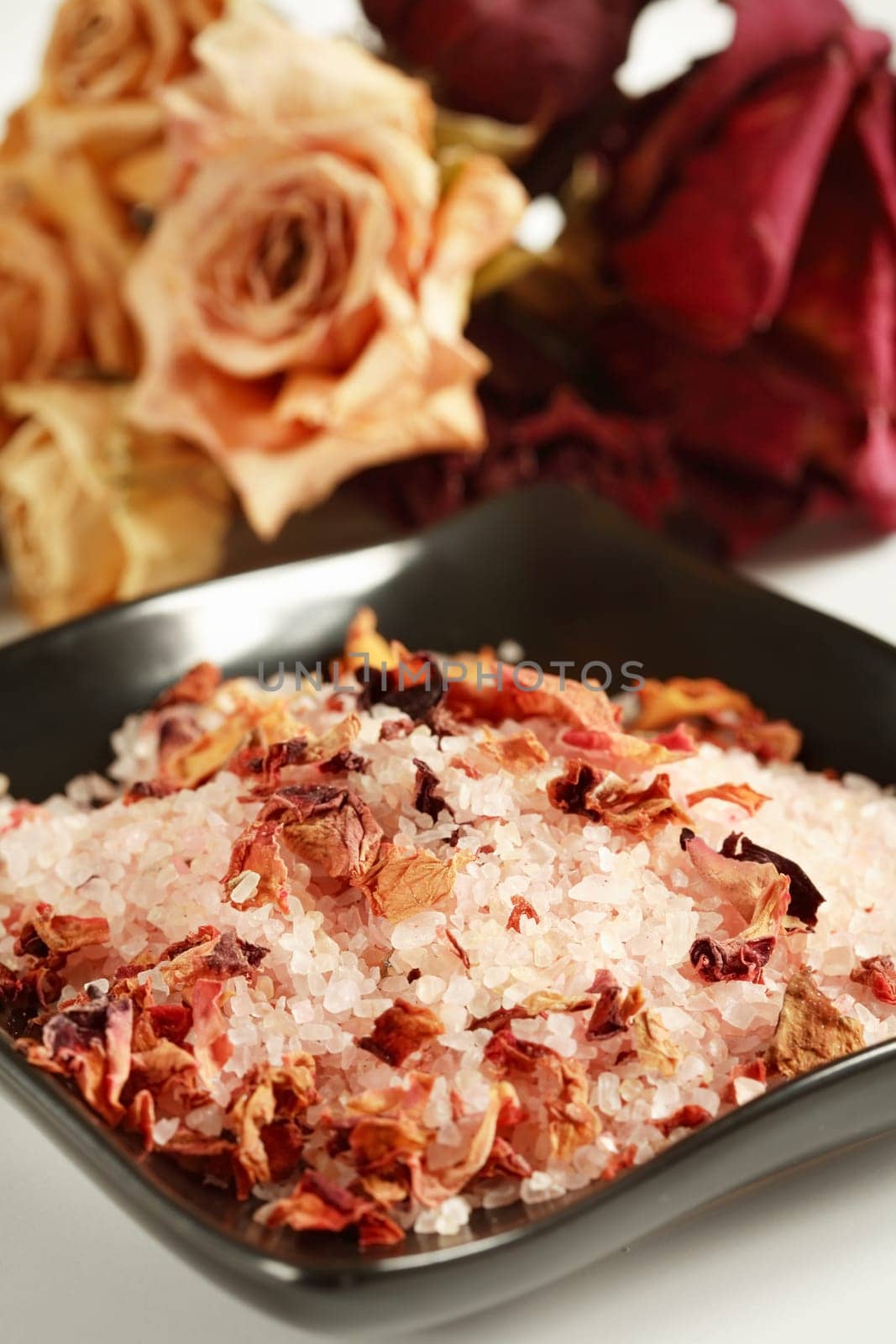 Bath salt with dry rose petals
