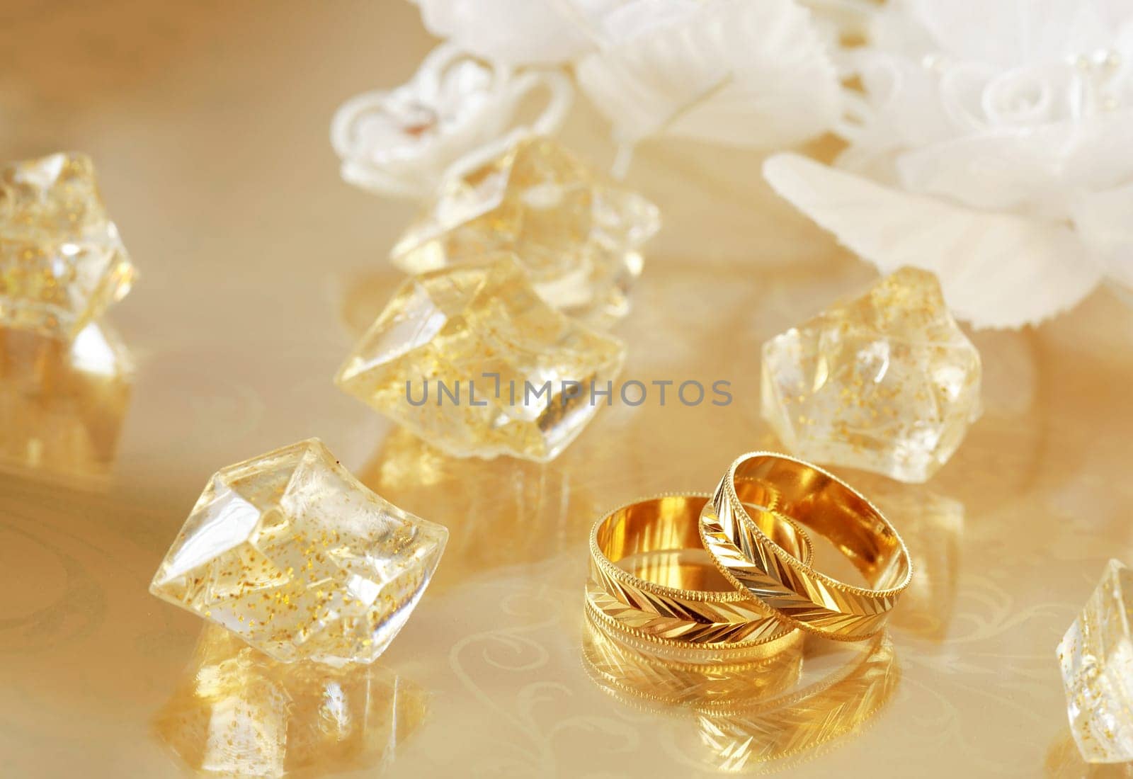 Golden wedding rings in yellow and golden tone