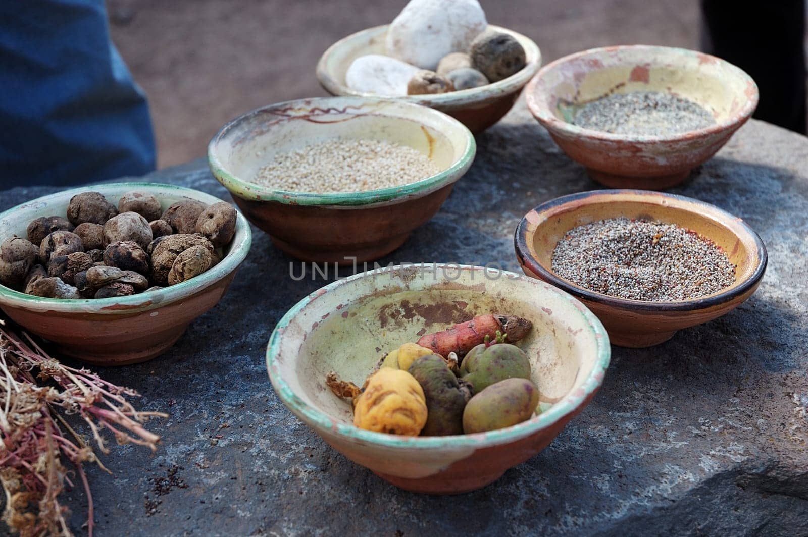A number of different types of potatoes and grains peruvians eat