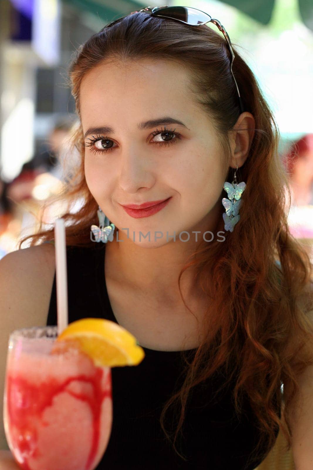 Young woman with a drink