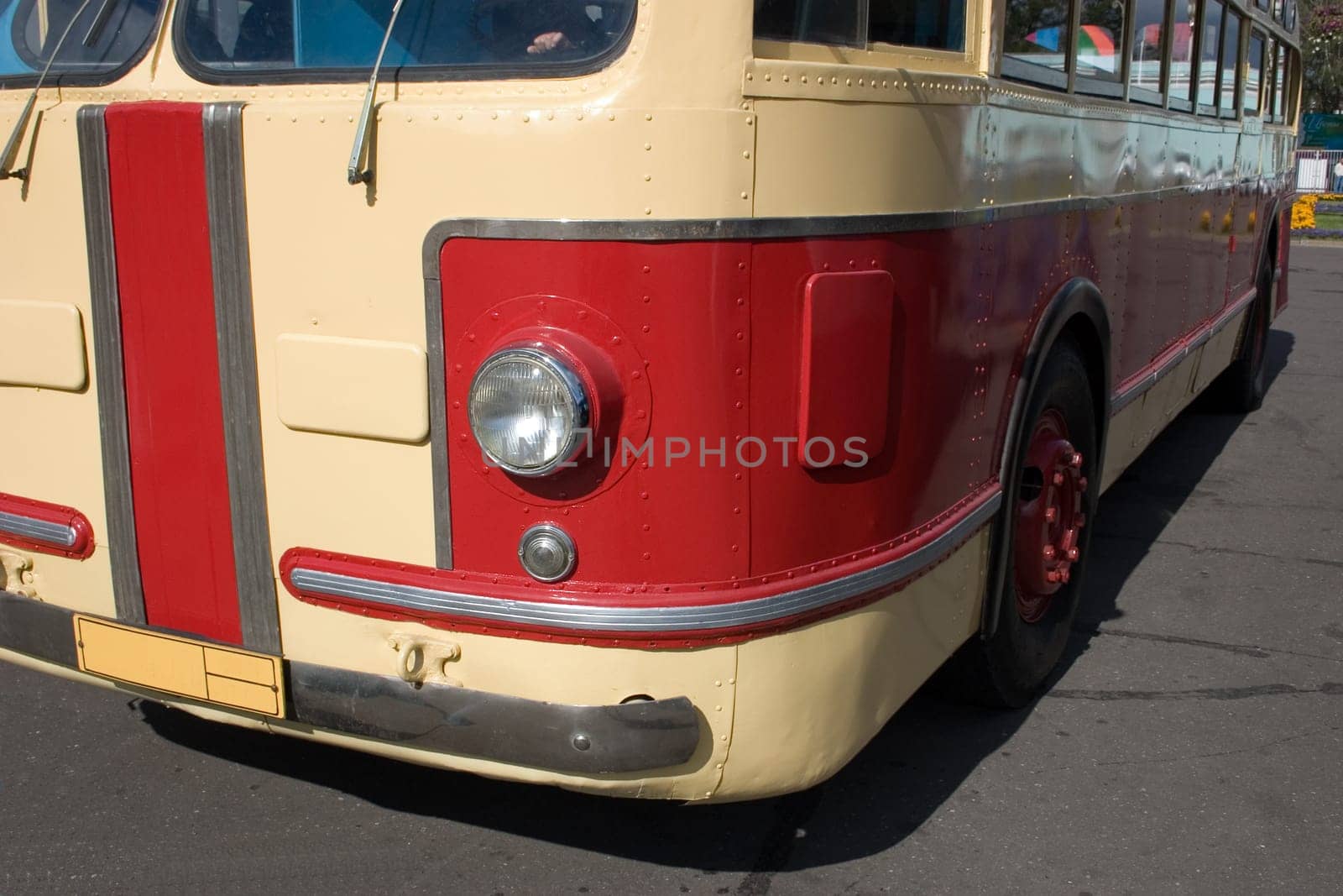 forehand of basket with the headlight of old bus