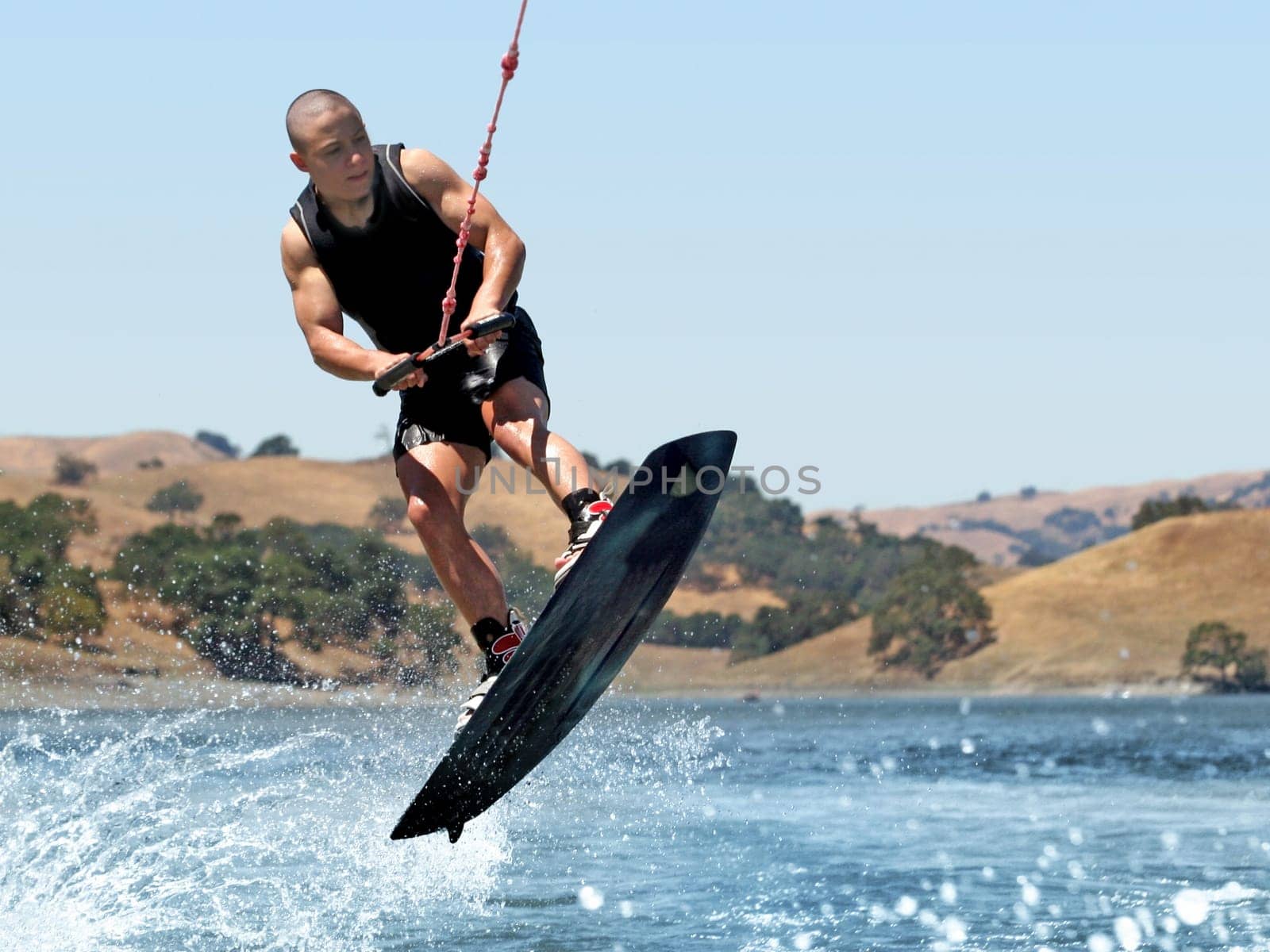 Boy Wakeboarding on the lake