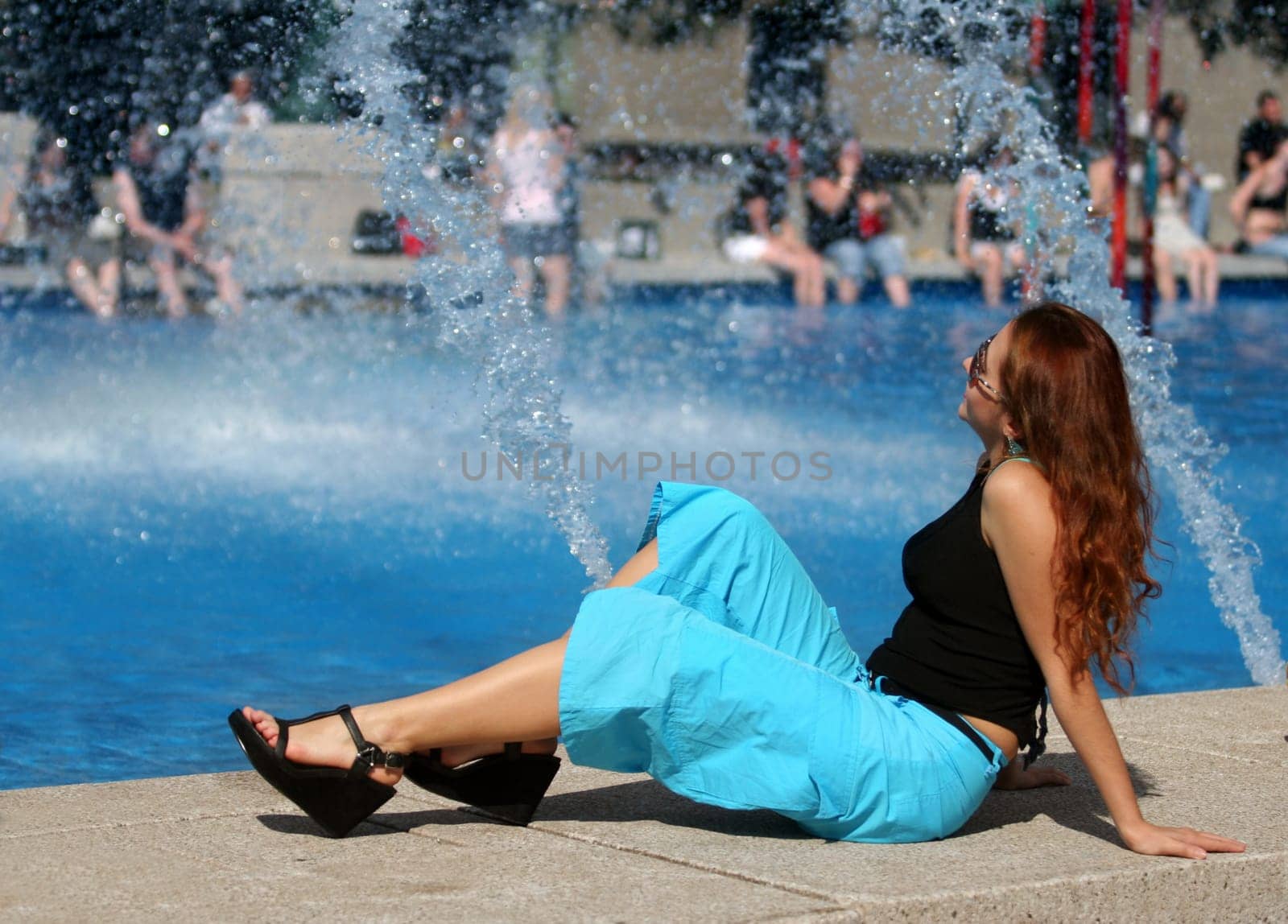 Girl by the pool