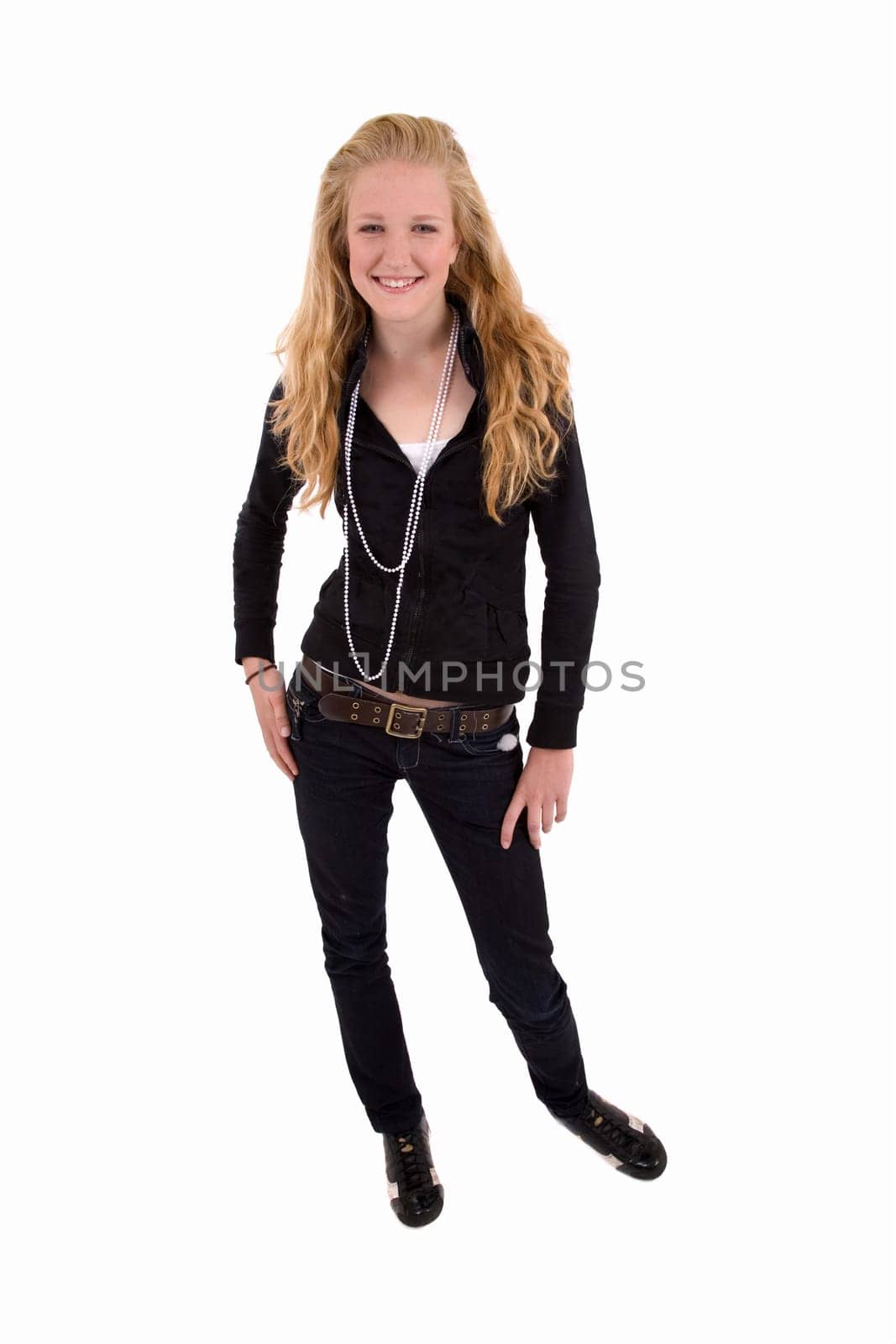 Cute blond teenager standing on white background