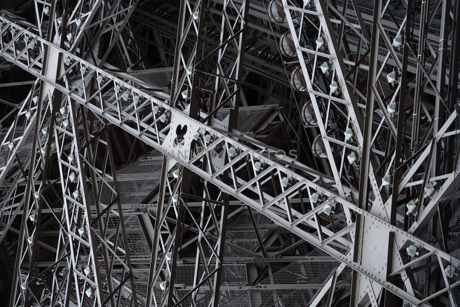 Criss-crossing support structure of the Eiffel Tower.