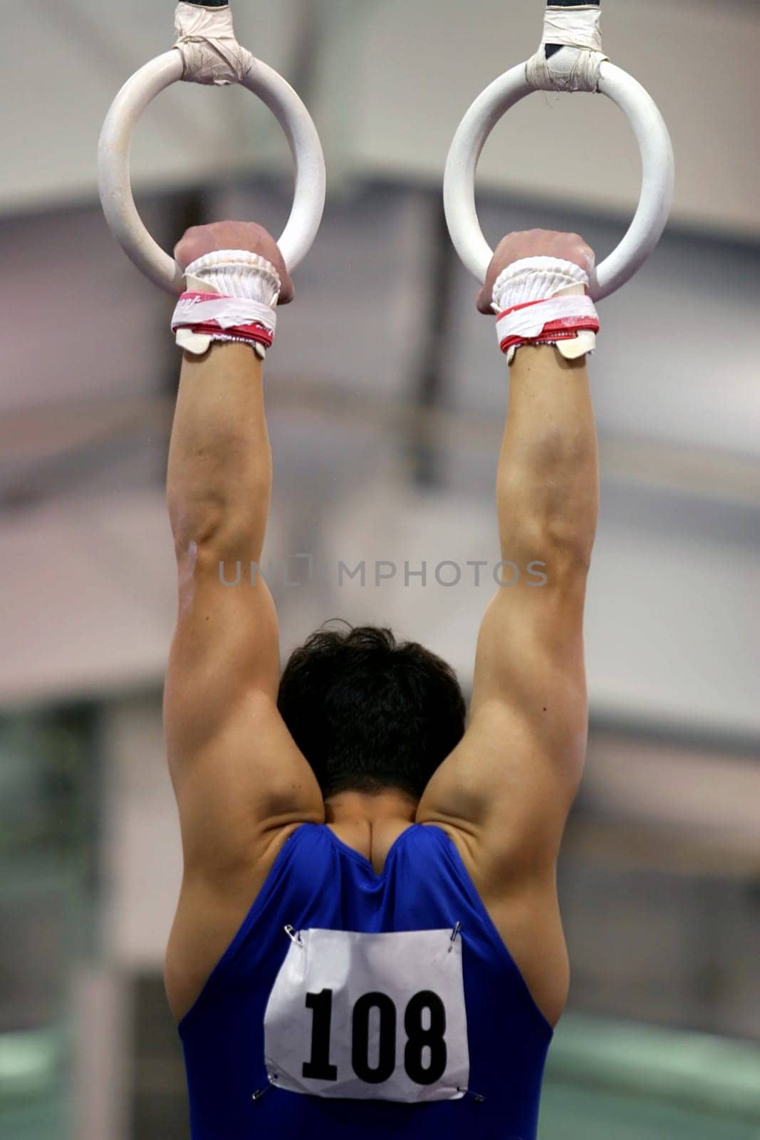 Gymnast competing on rings