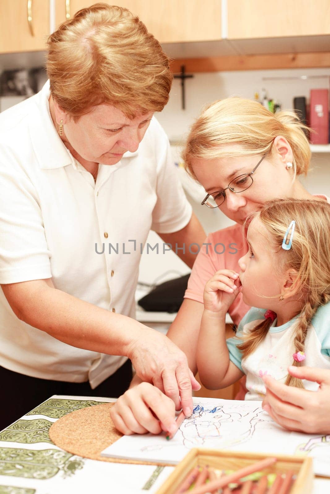 Three generation family by painting