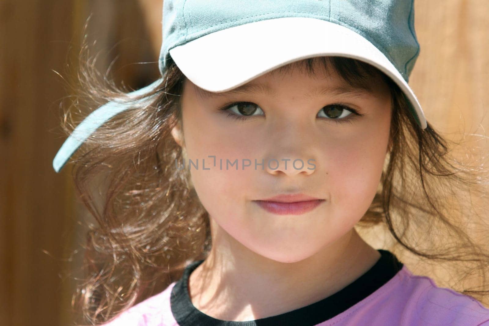 Happy little girl in a hat