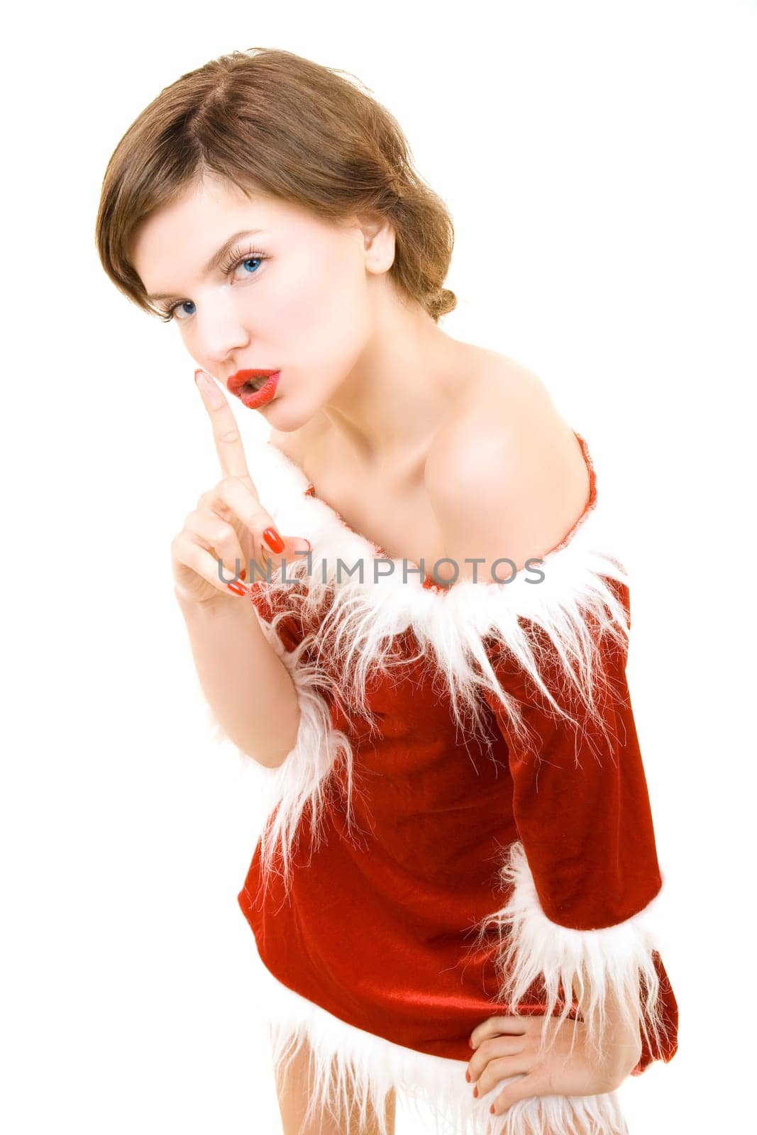 a christmas girl dressed in the red fur coat