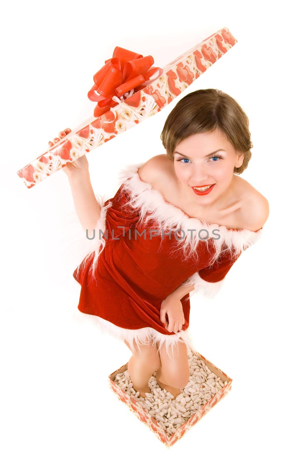 a christmas girl standing in the gift box