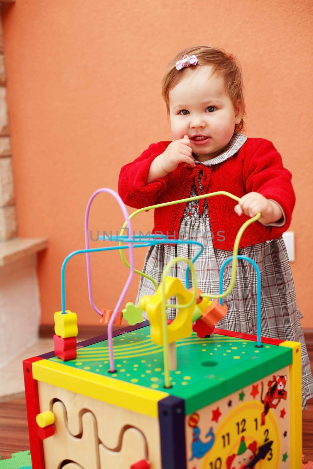 Portrait of cute baby with toys