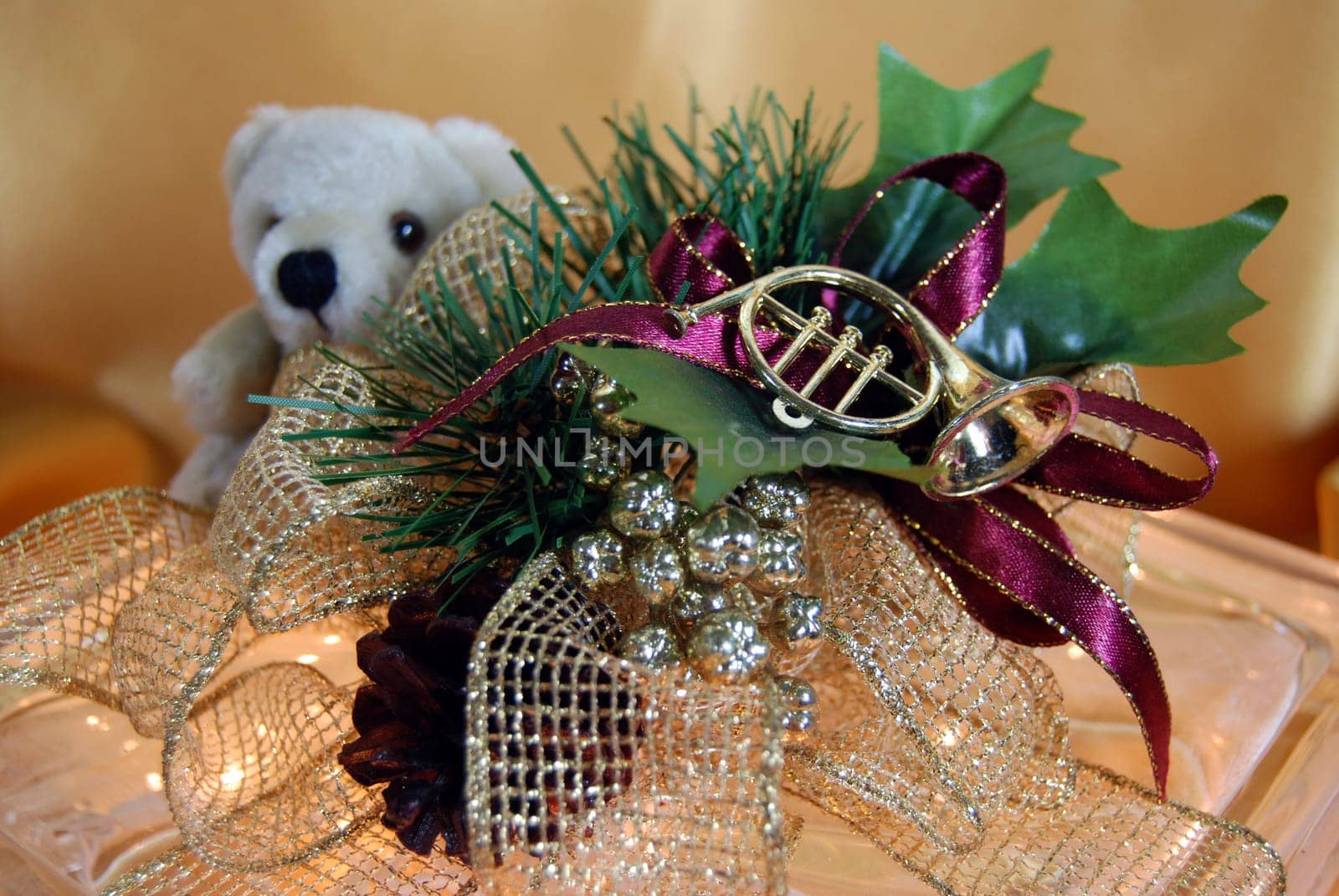 Festive sprig on a lighted glass block.