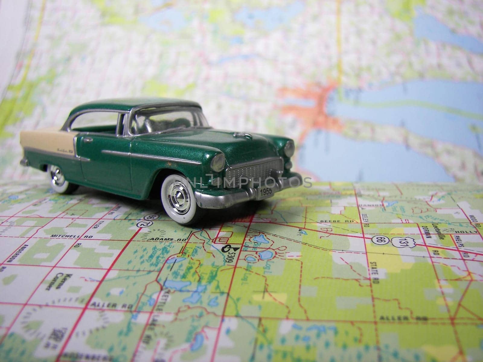 Minaiture 1955 Bel-Air Chevrolet on road map.