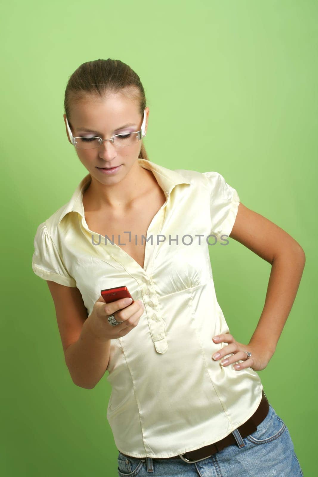 business portrait of a young and successful woman is calling with a mobilephone