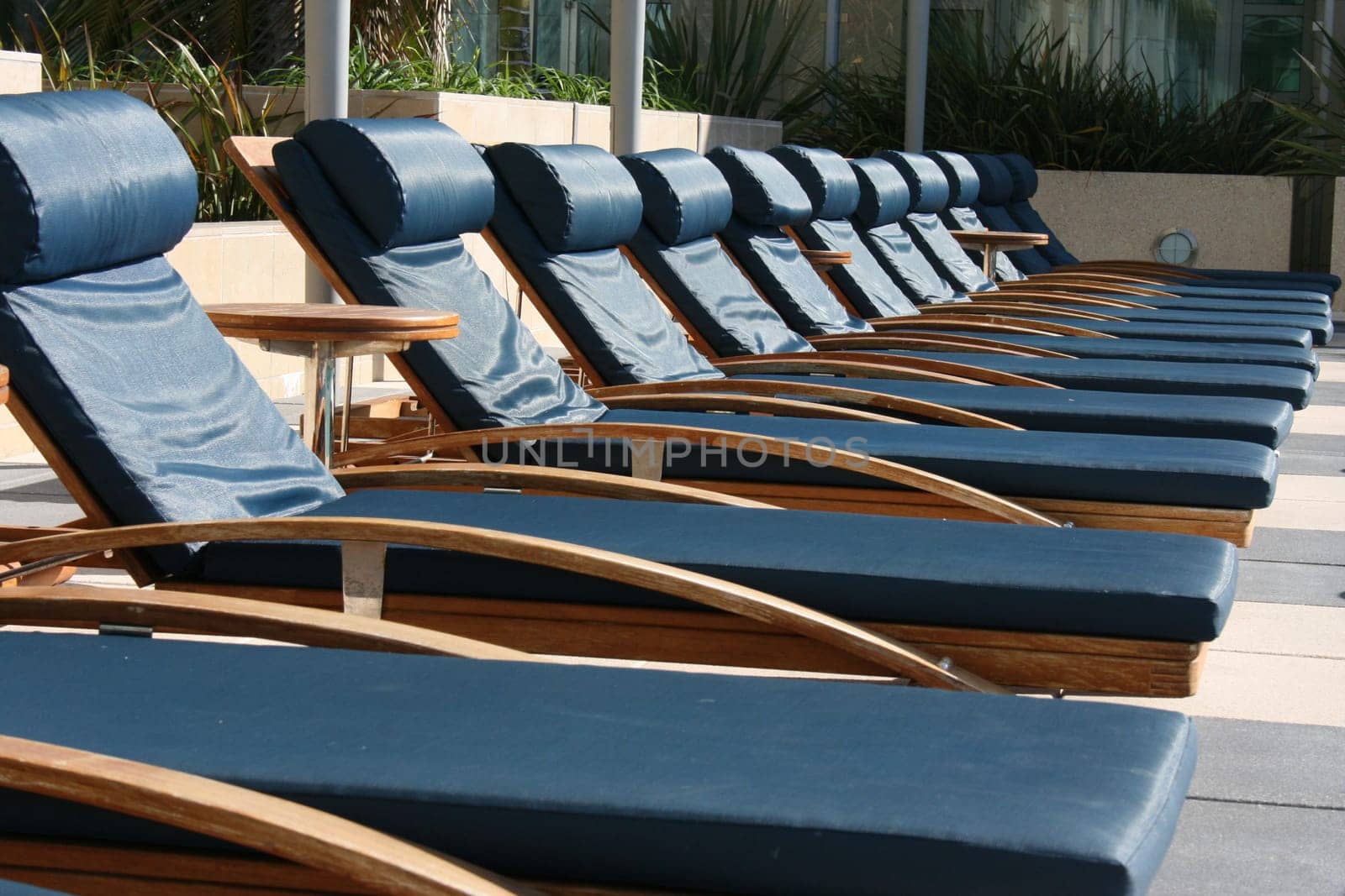 Poolside lounge chairs.